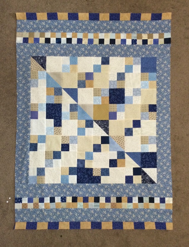 Baby sized scrap quilt